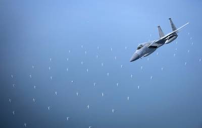 Illustration; A U.S. Air Force F-15C Eagle assigned to the 48th Fighter Wing, RAF Lakenheath, United Kingdom, breaks away from a KC-135 Stratotanker from the 100th Air Refueling Wing, RAF Mildenhall, U.K., after receiving fuel off the English Coast, April 23, 2020.   (U.S. Air Force photo by Tech. Sgt. Emerson Nuñez)
