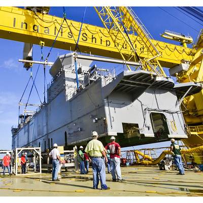 Ingalls Shipbuilding lands the 700-ton deckhouse on the amphibious assault ship Tripoli (LHA 7) on July 9. (Photo by Lance Davis/HII)
