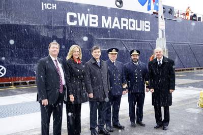 (L to R) Lafarge Purchasing Manager for Eastern Canada Ken Lerner, U.S. Saint Lawrence Seaway Development Corporation Administrator Betty Sutton, Saint Lawrence Seaway Management Corporation CEO Terence Bowles, Chief Engineer David Michalowicz, Captain Seann O'Donoughue, and CWB CEO Ian White in front of the CWB Marquis, April 2.