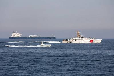 An L3Harris Arabian Fox MAST-13 unmanned surface vessel transits the Strait of Hormuz accompanied by USCGC Charles Moulthrope (WPC 1141) and USCGC John Scheuerman (WPC 1146) on April 19, 2023. (Photo: Vincent Aguirre / U.S. Coast Guard)