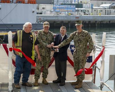 Left to right: Tim Davison, Engineered Construction Services, Inc.; Commander, Portsmouth Naval Shipyard (Acting) Capt. Jesse Nice; Program Executive Office, Industrial Infrastructure, Mark Edelson, Senior Executive Service Naval Sea Systems Command; Commander, Officer in Charge of Construction PNSY, Capt. Chad Brooks. (Photo: Charlotte C. Oliver / U.S. Navy)