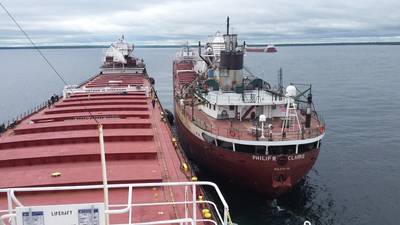 Lightering operations continue while the vessel Roger Blough is anchored in Waiska Bay to transfer its cargo to the Philip R. Clarke and Arthur M. Anderson. (Photo courtesy of Ken Gerasimos, Key Lakes Shipping)