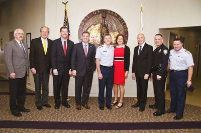 Lleft to right: Robert Monson, Port Auditor; Thomas Russell, Port General Counsel; Thomas Gresham, Port Technology Security Supervisor; Dan Malcolm, Chairman of the Board of Port Commissioners, Admiral and Mrs. Zukunft; John Bolduc, Acting President/CEO; Mark Stainbrook, Acting Chief of Police and Captain Jonathan Spaner, Commander, Coast Guard Sector San Diego (Photo: Arash Afshar)