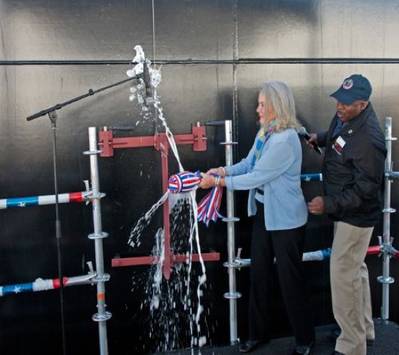 Lyn Glenn christening the ship: Photo courtesy of NASSCO