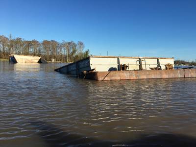 Members from Coast Guard Marine Safety Unit Morgan City’s marine inspections team and investigations team respond to a report of a towing vessel that ran aground on the Gulf Intracoastal Waterway at mile marker 99, near Berwick, La., February 3, 2020. The towing vessel company has hired a salvage company to assist the salvage of the barge. (U.S. Coast Guard photo) 