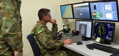 Members of the Australian Defense Force training at one of the 12 NAUTIS desktop stations at the Townsville base