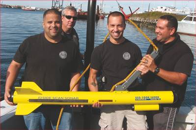 Members of the New Bedford Police Dept. Port Security Team with their Fisher side scan sonar