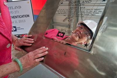 Mrs Bonnie Amos authenticates the keel: Photo credit HII