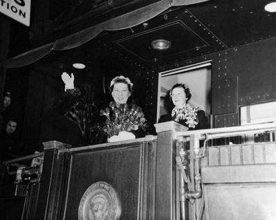Nautilus (SSN-571) launching on 21 January 1954, at the Electric Boat Company, Groton, Connecticut. Submarine sponsor Mrs. Dwight D. Eisenhower, on board the Presidential Train arrives at the ceremonies. (Photo: National Museum of the U.S. Navy)