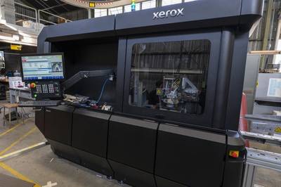 Naval Postgraduate School (NPS) recently installed Xerox’s ElemX 3D Liquid Metal Printer in the Large Experiment Annex at the Naval Postgraduate School (NPS).  NPS is the first site to receive installation of this new technology. (U.S. Navy photo by Mass Communication Specialist 3rd Class Lenny Weston/RELEASED)