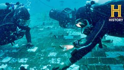 Underwater explorer and marine biologist Mike Barnette and wreck diver Jimmy Gadomski explore a twenty-foot segment of the 1986 Space Shuttle Challenger, the team discovered in the waters off the coast of Florida, U.S., during the filming a History Channel documentary called "The Bermuda Triangle: Into Cursed Waters", in this handout picture taken May, 2022. (Photo: The HISTORY® Channel)