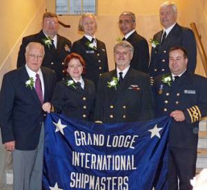 New officers (both elected and appointed):  Front, L to R:  (Elected Officers) Grand Secretary-Treasurer George Skuggen, Grand 2nd Vice President Rebecca Hancock, Grand President Tom McMullen, Grand 1st Vice President Seann O'Donoughue;  Back, L to R: (Appointed officers) Grand Marshal Joe Walters, Grand Chaplain Camilla Ross, Grand Warden Mark Stevenson, Grand Sentinel Mike Pratt. Photo courtesy the ISMA