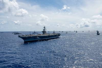 Nimitz-class aircraft carrier USS Carl Vinson (CVN 70) sails in formation off the coast of Hawaii during Exercise Rim of the Pacific (RIMPAC) 2024, July 22. (Photo: John Bellino / U.S. Navy)