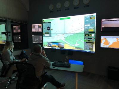 Deck officers Bridget Quinn and Adam Szloch remotely command the autonomous NELLIE BLY in Denmark from Sea Machines’ Boston control room. The SM300 provides the remote commanders with full shore-to-vessel connectivity and control and includes an active chart environment with live augmented data overlays, state of vessel, situational awareness and environmental data, as well as real-time, vessel-born audio and video from many streaming cameras. (Photo: Sea Machines)