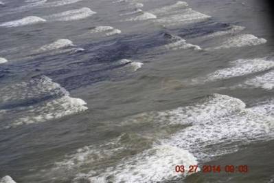 Oil washing ashore Matagorda Island: USCG photo