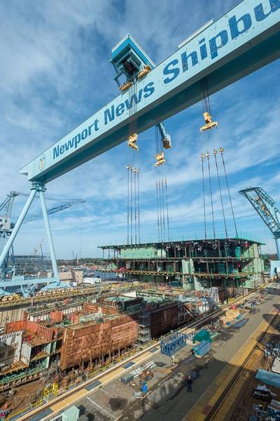 On January 17, Newport News shipbuilders lifted a 704-metric-ton unit into Dry Dock 12, where the aircraft carrier John F. Kennedy (CVN 79) is taking shape. (Photo by Chris Oxley/HII)
