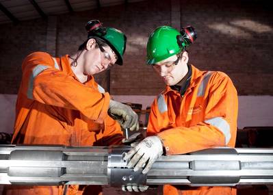 Onshore Technician, Lewis Brake (L) and Ian Spence, Onshore Supervisor (R) working on a Coretrax SP superior performance magnet.