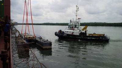 The PASAM assisting at the assembly of the DASERAH at Port Harcourt along the transport vessel. (Photo courtesy: Damen)