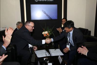 Patrick Ryan, ABS Senior Vice President and Chief Technology Officer, shakes hands with Joong Kyoo Kang, Executive Vice President and Head of Hanwha Ocean R&D Institute. (Photo: ABS)
