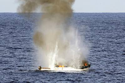 Pirate skiff destroyed: Photo credit ABIS Jayson Tufrey, Commonwealth of Australia