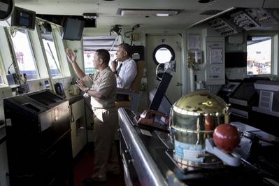 President Barack Obama talks with Captain Vince Sibala on the bridge of the BRP Gregorio del Pilar (PF-15), during a tour of the ship in Manila Harbor, Philippines, Nov. 17, 2015. (Official White House Photo by Pete Souza)