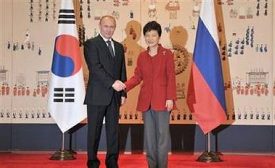 Putin & Park shake hands: Photo courtesy of the Russian Federation