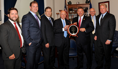 Rep. Bill Shuster is presented with the Champion of Maritime Award from the American Maritime Partnership.   L to R: Ben Billings, President, Offshore Marine Service Association; Stephen Martinko, Executive Director at Port of Pittsburgh Commission; Dave Grzebinski, President and CEO, Kirby Corporation; Thomas Allegretti, AMP Chairman and President and CEO American Waterways Operators; Rep. Bill Shuster; Barry Holliday, Executive Director for the Dredging Contractors of America; Matthew Paxton, 