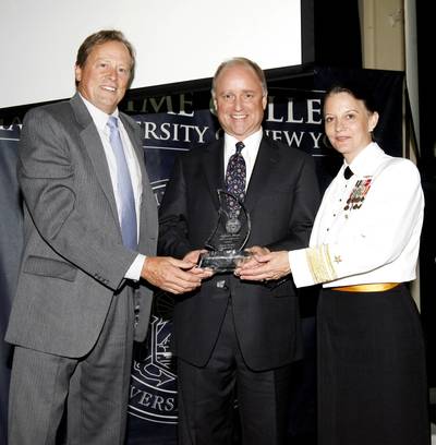 left to right: Jim Lawrence, chairman, Marine Money; Tom Crowley; and RADM Wendi B. Carpenter, USN, (Ret.), President, SUNY Maritime College.