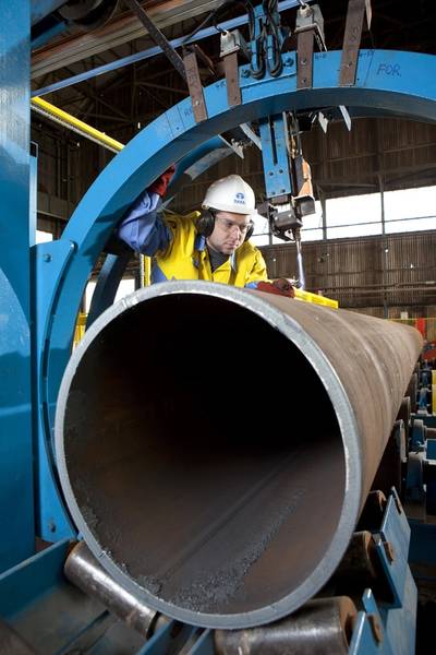 Robert Instone prepares cutting tool to produce section for offshore wind turbine foundation
