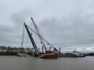 Rock barge ACL 01700 split in half and sunk after grounding near Mile Marker 99 in Berwick, La. earlier this week. Salvage operations have continued day and night. (Photo Alexandria Preston / U.S. Coast Guard)