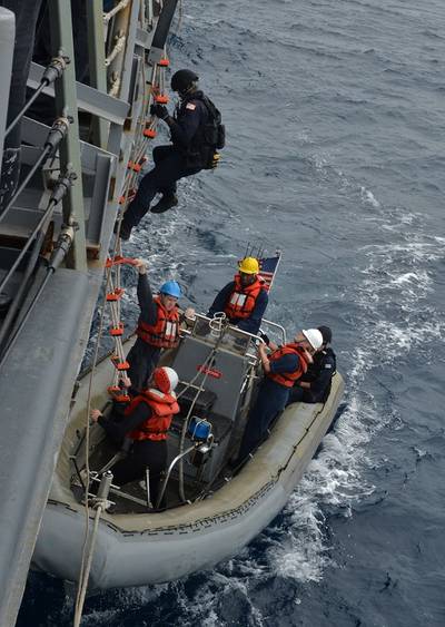 Sailors assigned to the U.S. Coast Guard Law Enforcement Detachment Team 101 embark onto a rigid-hull inflatable boat during small boat operations aboard the guided-missile frigate USS Gary (FFG 51). Joint interagency and international relationships strengthen U.S. Third Fleet's ability to respond to crises and protect the collective maritime interests of the U.S. and its allies and partners. (U.S. Navy photo by Mass Communication Specialist 2nd Class Derek Stroop)