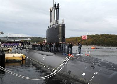 Sailors assigned to the Virginia-class attack submarine Pre-Commissioning Unit (PCU) Illinois (SSN 786) salute after bringing the ship to life during a rehearsal for the submarine's commissioning ceremony. Illinois is the U.S. Navy's 13th Virginia-Class attack submarine and the fourth U.S. Navy ship named for the state of Illinois. (U.S. Navy photo by Darryl I. Wood)