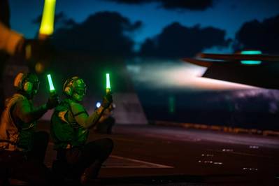 Sailors launch an F/A-18F Super Hornet from VFA-22 during flight operations aboard USS Nimitz (CVN 68) in the Philippine Sea. (MC3 Hannah Kantner, US Navy)