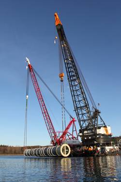 Salvage of a 485-ton, 140-foot long stainless steel reactor vessel that rolled off a barge.