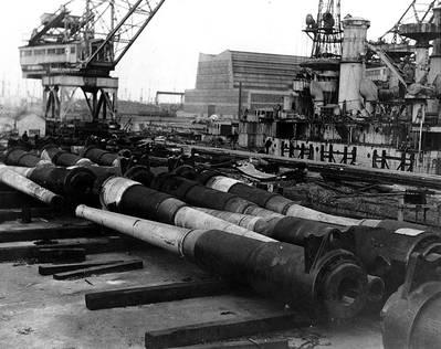 Ship being dismantled in the backround is USS South Carolina (BB-26) (U.S. Naval Historical Center. Courtesy of the San Francisco Maritime Museum, San Francisco, California)