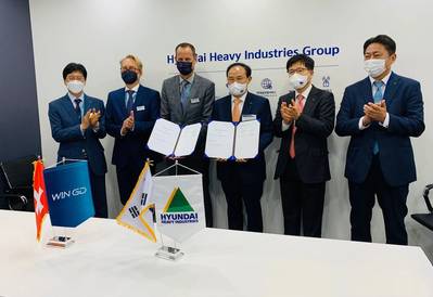Signing ceremony hosted by HHI-EMD President & Chief Operating Officer Kwang-hean An and joined by WinGD’s Executive Vice President, R&D Dominik Schneiter and Executive Director Sales, Volkmar Galke. Image courtesy WinGD/HHI-EMD
