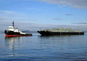 Similar MacGregor self-loading/unloding system onboard 7000 dwt cement barge Pacific Sounder. Photo courtesy Cargotec Press Office