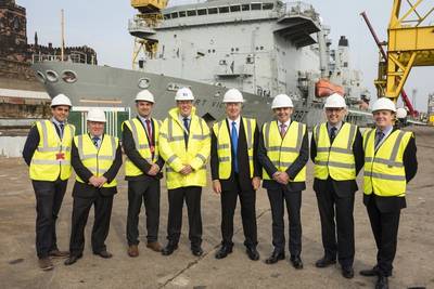 Sir Michael Fallon center with Cammell Laird team John Syvret CEO to his left Linton Roberts managing director to his right (Photo: Cammell Laird Shipyard)