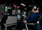 Sonar Technician (Surface) 1st Class Mark Osborne supervises Sonar Technician (Surface) 2nd Class Randy Loewen, left, and Sonar Technician (Surface) 3rd Class Roland Stout, right, as they monitor contacts on an AN/SQQ-89V15 Surface Anti Submarine Combat System, aboard the guided missile destroyer USS Momsen (DDG 92). Ships and aircraft assigned to Carrier Strike Group (CSG) 9 are underway off the coast of Southern California participating in a Joint Task Force Exercise. U.S. Navy photo by Mass C