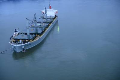 Sparna reportedly briefly ran aground while transiting the Columbia River near Cathlamet, Wash., March 21, 2016. The vessel is safely anchored, and is maintaining position, with the assistance of two tugs, as an approved salvage and repair plan is developed. (U.S. Coast Guard photo by Levi Read)