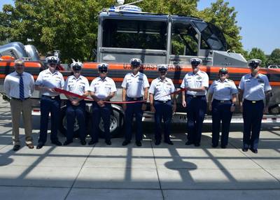 The crew of Station Paducah stand in front of a 29-foot Response Boat-Small II boat at the station commissioning, Aug. 26, 2021 held in Paducah, Ky. Station Paducah is the third of five new Coast Guard stations to be commissioned in the Coast Guard 8th District Western Rivers Sectors. (Photo: Jonathan Lally / U.S. Coast Guard)