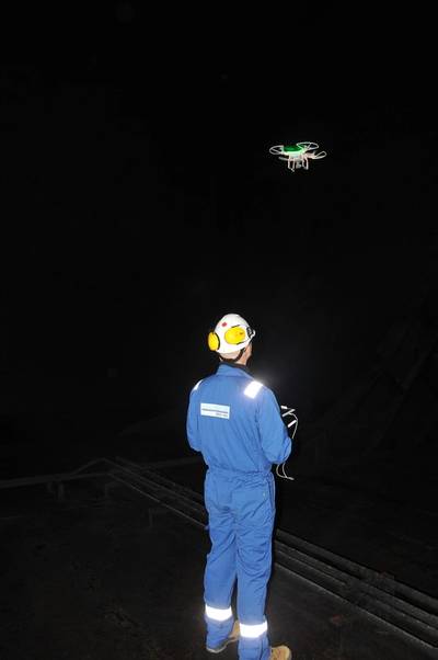 DNV GL surveyors tested a camera-equipped drone to visually evaluate structural components through video streamed to a tablet. One surveyor operated the drone, while a second checked the video feed in real time.