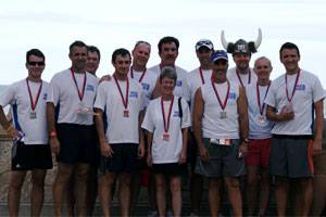 Team W&O at the completion of the race: Art Parrish, Jack Guidry, Mike Page, Collin Luke, Carl Herman, Peter Osterman (back), Sandy White (in front of Peter), Steve Stafford, Alex Piquer, Kyle Posey (in horns), Lisa Collins, Rogier Blokdijk.