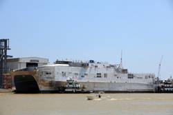 The 338-foot-long aluminum catamarans are designed to be fast, flexible and maneuverable even in shallow waters, making them ideal for transporting troops and equipment quickly within a theater of operations. (U.S. Navy photo Courtesy Austal USA/Released) 