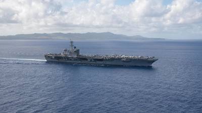 The aircraft carrier USS Theodore Roosevelt (CVN 71) returns to operations in the Philippine Sea on May 21 following an extended visit to Guam in the midst of the COVID-19 global pandemic. (U.S. Navy photo by Kaylianna Genier)