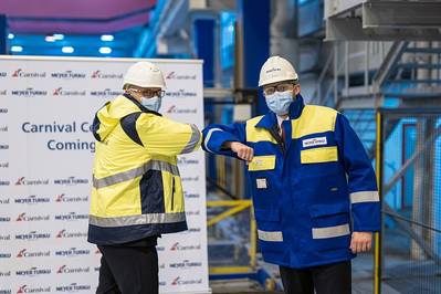 The Carnival Celebration steel cutting ceremony was attended by Carnival’s Senior Vice President of New Builds Ben Clement and Meyer Turku’s CEO Tim Meyer. (Photo: Carnival Cruise Line)