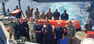 The crew of LCU 2032 Palo Alto display the plaque they received from the Sailors assigned to the Indonesian Navy ship KRI Panah-626 for rescuing an overboard fisherman after his boat capsized boat 10 miles off the western coast of Obi Island, Indonesia Sept. 1, 2023. (Courtesy asset)