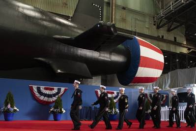 The crew of the Virginia-class attack submarine pre-commissioning unit (PCU) Idaho (SSN 799) march in formation during a christening ceremony at General Dynamics Electric Boat shipyard facility in Groton, Conn., March 16, 2024. (Source: U.S. Navy)