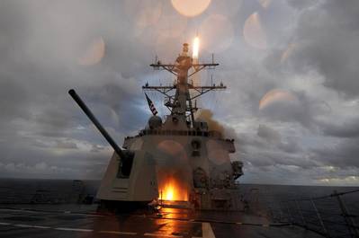 The guided-missile destroyer USS Mustin (DDG 89) fires a Standard Missile 2 missile from the ship's forward and aft missile decks during a missile exercise. Mustin is one of seven guided missile destroyers assigned to Destroyer Squadron 15 and is forward deployed to Yokosuka, Japan. (U.S. Navy photo by Mass Communication Specialist 2nd Class Devon Dow/Released)