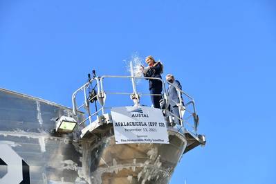 The Honorable Kelly Loeffler, ship sponsor of USNS Apalachicola, performed the ceremonial bottle break over the bow of the ship, the 13th EPF designed and constructed by Austal USA and the second U.S. Navy ship to be named after the Florida coast city. Image courtesy Austal USA